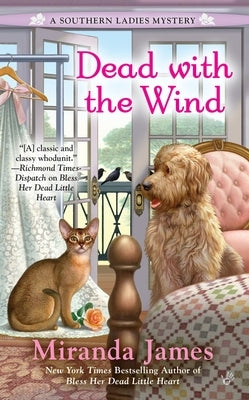 Mass market paperback of "Dead with the Wind" by Berkley Books, featuring a cover image with dark, atmospheric artwork.