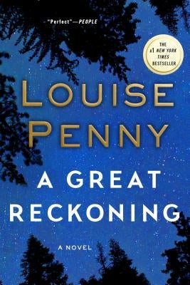 Paperback of "A Great Reckoning" by Minotaur Books, featuring the book cover with dark, atmospheric artwork.