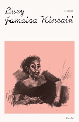 Paperback novel "Lucy" by Picador USA, featuring the book's cover with title and author details.
