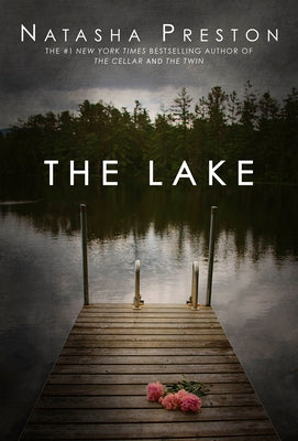 Paperback book titled "The Lake" by Delacorte Press with a scenic cover image showing a tranquil lakeside scene.