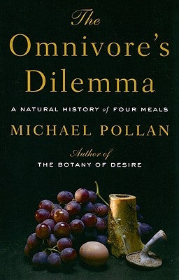 Large print paperback of The Omnivores Dilemma by Large Print Press with a cover featuring an illustrated design.