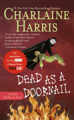 Mass market paperbound copy of "Dead as a Doornail" by Ace Books, featuring the book cover with dark and eerie design elements.