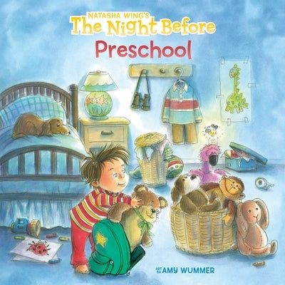 Paperback copy of The Night Before Preschool book by Grosset & Dunlap, showing colorful cover with playful illustrations.