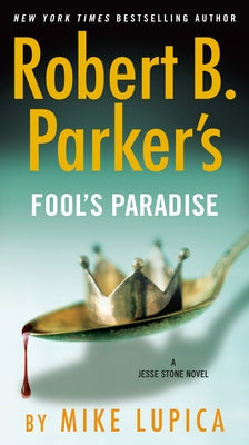 Mass market paperback of Robert B. Parker's Fool's Paradise featuring the book cover with bold title and author name, G.P. Putnam's Sons.