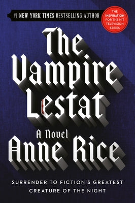 Paperback copy of The Vampire Lestat by Ballantine Books with a dark, illustrated cover featuring a vampire character.