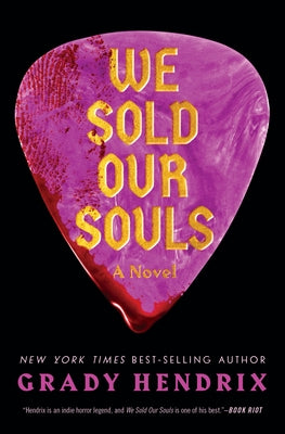 Paperback of "We Sold Our Souls" by Quirk Books, featuring the book cover with dark, striking artwork and title text.