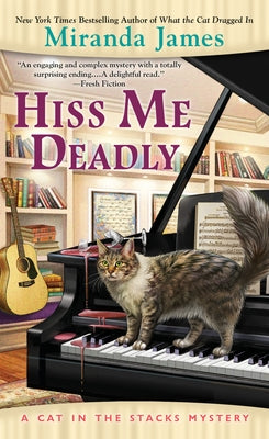 Hiss Me Deadly mass market paperback by Berkley Books featuring a dark, mysterious cover with a snake illustration.