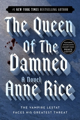 Paperback edition of Queen of the Damned by Ballantine Books, featuring the book cover with dark artwork and title text.
