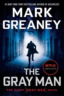 Paperback of The Gray Man by Berkley Books featuring the book cover with a dark, mysterious design and title text.