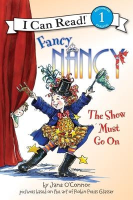 Paperback of Fancy Nancy: The Show Must Go On by HarperCollins, featuring a colorful book cover with Nancy in a theatrical setting.