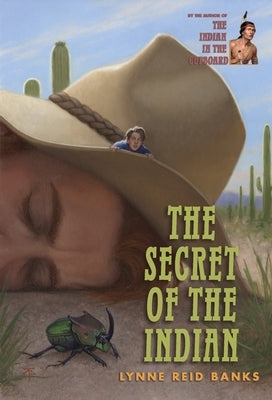Paperback of The Secret of the Indian by Yearling Books featuring colorful cover art with children and jungle scene.