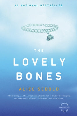 Paperback copy of The Lovely Bones by Back Bay Books featuring the book cover with a dark, atmospheric design.