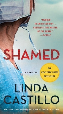 Mass market paperback of "Shamed: A Novel of Suspense" by St Martins, showing the front cover featuring dark, suspenseful artwork.