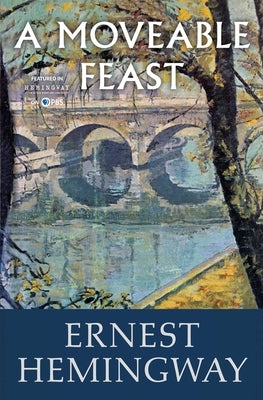 Paperback of "A Moveable Feast" by Scribner Book Company showing the book cover with title and author text visible.