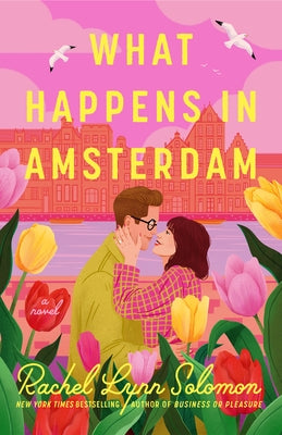 Paperback book titled "What Happens in Amsterdam" by Penguin Publishing Group, with a colorful cover design.