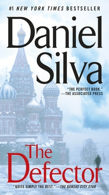 Cover image of "The Defector" mass market paperback book by Berkley Books featuring a dramatic cover design.