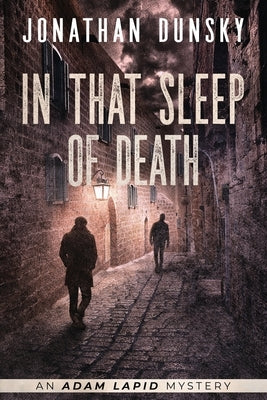 Paperback of "In That Sleep of Death" by Lion Cub Publishing, showing the book cover with dark and moody artwork.
