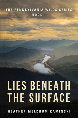 Paperback copy of "Lies Beneath the Surface" from the Pennsylvania Wilds Series, showing the front cover with title and author details.