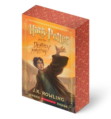 Paperback of Harry Potter and the Deathly Hallows by Scholastic Inc. with stenciled edges, featuring a mystical book cover.