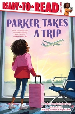 Paperback copy of Parker Takes a Trip, a Ready-To-Read Level 1 book by Simon Spotlight featuring colorful illustrations.