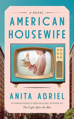 Paperback of American Housewife by Lake Union Publishing showing the book cover with title and author details.