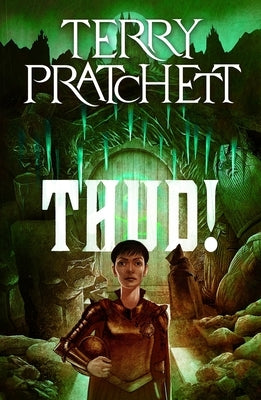 Paperback copy of Thud! A Discworld Novel by Harper Paperbacks, featuring a colorful cover illustration.
