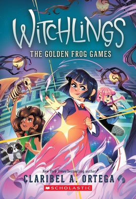 Paperback of The Golden Frog Games (Witchlings 2) by Scholastic Inc., featuring colorful cover art with whimsical illustrations.