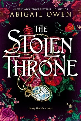 Paperback of The Stolen Throne by Entangled Publishing showing the front cover with fantasy artwork and title text.