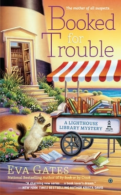Mass market paperbound book titled "Booked for Trouble" by Berkley Books, featuring a colorful cover design.