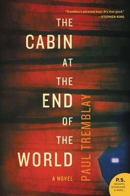 Paperback copy of "The Cabin at the End of the World" by William Morrow & Company, featuring a dark, atmospheric cover.