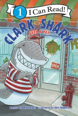 Paperback book cover of Clark the Shark Gets a Pet by HarperCollins featuring colorful illustrations of Clark with his new pet.