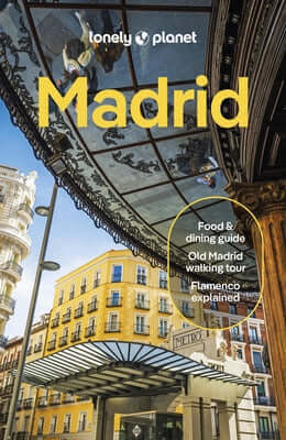 Paperback Lonely Planet Madrid travel guide with detailed maps and city highlights, designed for exploring Madrid.