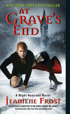 Mass market paperbound copy of "At Grave's End" by Night Huntress Novel series, featuring dark fantasy cover art.