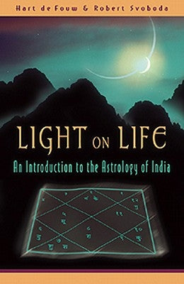 Mass market paperback of Light on Life: An Introduction to the Astrology of India by Lotus Press, featuring a cover with celestial symbols.