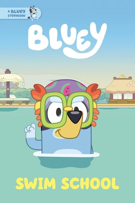 Paperback of "Swim School: A Bluey Storybook" by Penguin Young Readers Licenses, featuring Bluey and friends on the cover.
