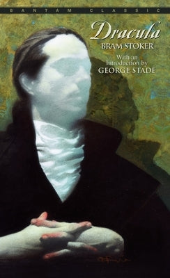 Mass market paperbound edition of Bram Stoker's Dracula by Bantam Classics, showing the book cover with dark gothic artwork.