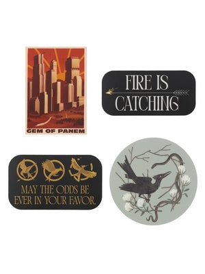 Set of four Hunger Games-themed stickers from Out of Print Clothing, featuring assorted designs on a white background.
