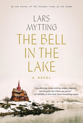 Paperback copy of "The Bell in the Lake" novel by Overlook Press with a cover image featuring a serene lake scene.