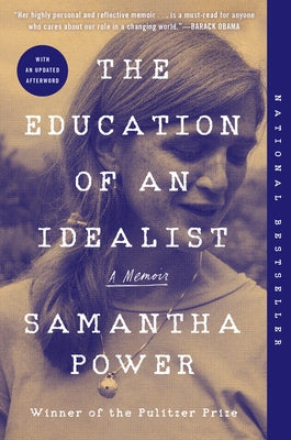 Paperback copy of "The Education of an Idealist" memoir by Dey Street Books, featuring the book cover with title and author's name.