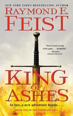 Mass market paperback of "King of Ashes" by Harper Voyager, featuring the book cover with fiery artwork and fantasy themes.