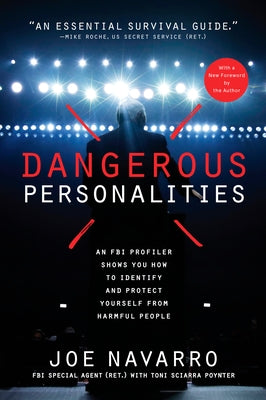 Paperback book titled "Dangerous Personalities" by Rodale Books, featuring a cover with warning symbols and a person's face.