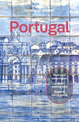 Paperback Lonely Planet Portugal travel guide with colorful cover, featuring images of Portugal’s landmarks and scenic landscapes.