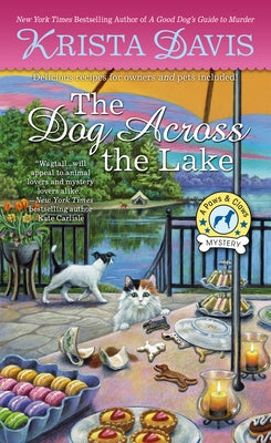 Mass market paperback of "The Dog Across the Lake" by Berkley Books, featuring a scenic lake cover illustration.