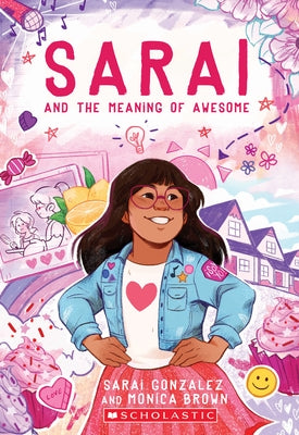 Paperback copy of Sarai and the Meaning of Awesome by Scholastic Inc., showing the colorful book cover with illustration and title.