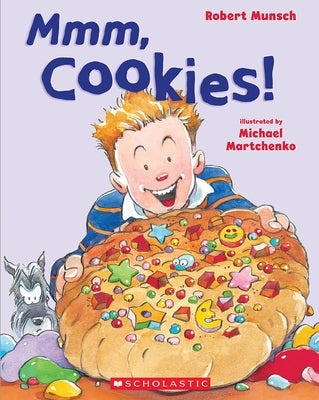 Scholastic Canada paperback book titled "MMM, Cookies!" featuring colorful cover art with illustrations of cookies and a playful font.