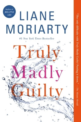 Paperback of Truly Madly Guilty novel by Flatiron Books, showing the book cover with title and author details.