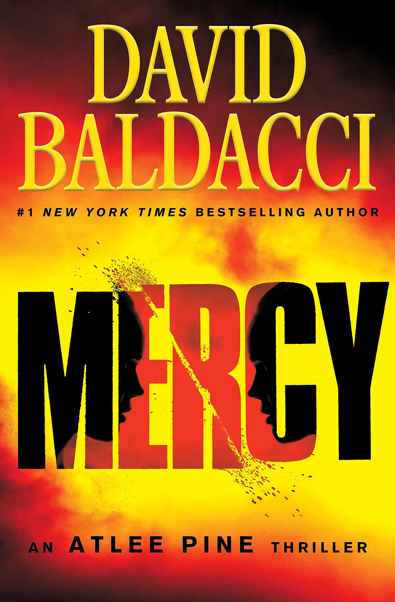 Paperback copy of "Mercy," the fourth Atlee Pine thriller by Grand Central Publishing, showing the book cover with title and author.