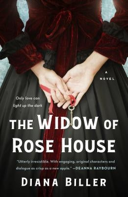 Paperback of The Widow of Rose House by St. Martin's Griffin, featuring the book cover with dark floral artwork.