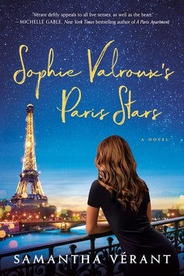 Paperback copy of Sophie Valroux's Paris Stars novel with a colorful cover featuring Parisian imagery, published by Berkley Books.