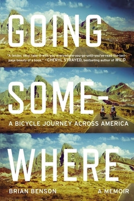 Paperback copy of "Going Somewhere: A Bicycle Journey Across America" by Penguin Publishing Group, featuring a scenic cover image.